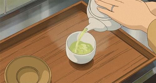 Anime character pouring tea into a cup